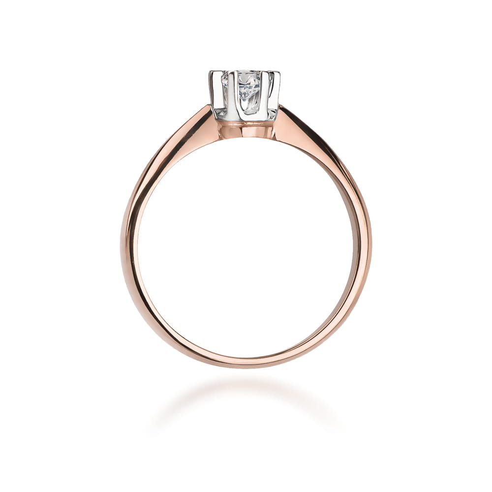 W0036.R3.LDW.03_3 Złoty pierścionek z diamentem w centralnej części, o eleganckim, minimalistycznym designie.