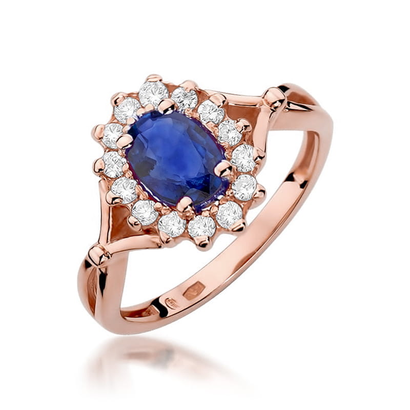 W0182.R3.SAB.02_1 Złoty pierścionek z owalnym szafirem otoczonym diamentami.