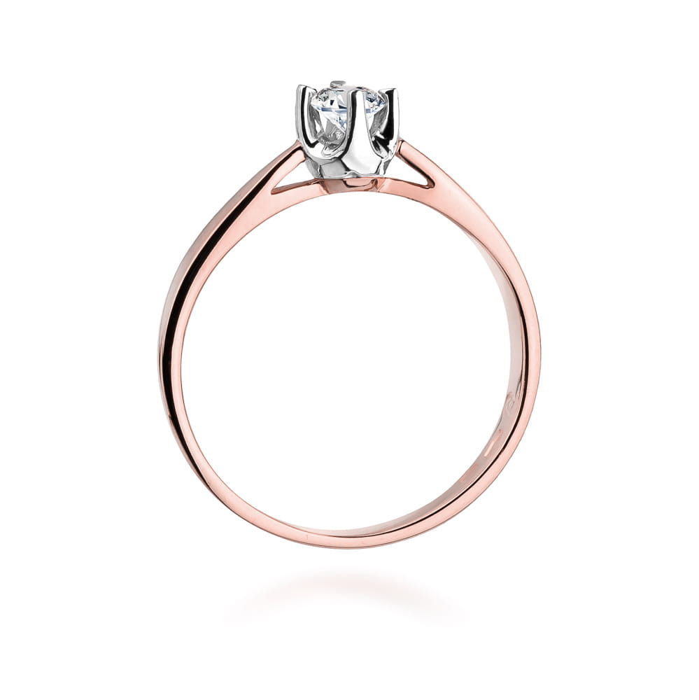 W0293.R3.DIW.01_3 Złoty pierścionek z diamentem, o nowoczesnym designie, z delikatnym, różowym obrączką i srebrnym osadzeniem kamienia.