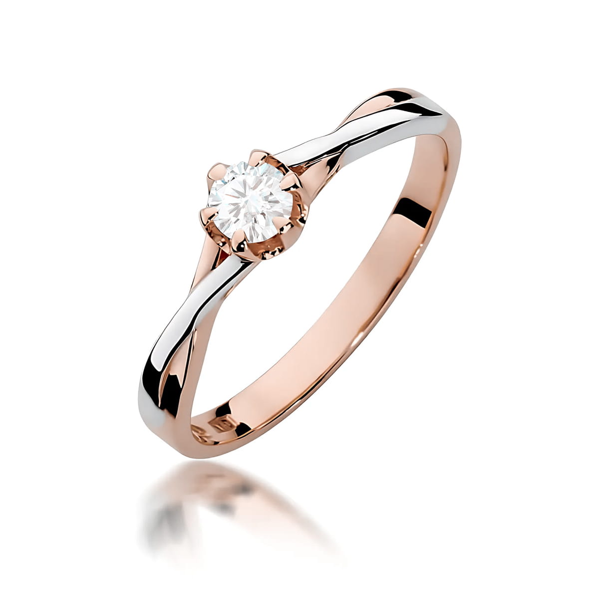 W0340.R3.LDW.05_1 Pierścionek z różowego złota z diamentem w centralnej części, o eleganckim, minimalistycznym designie.