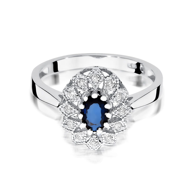 W0354.B3.SAB.01_2 Srebrny pierścionek z owalnym, niebieskim kamieniem otoczonym diamentami.