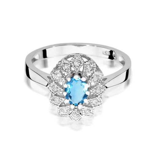 Srebrny pierścionek z niebieskim kamieniem w kształcie owalnym, otoczony diamentowymi zdobieniami.