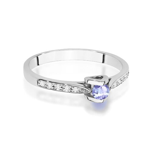 Srebrny pierścionek z niebieskim kamieniem i błyszczącymi cyrkoniami na obrączce.