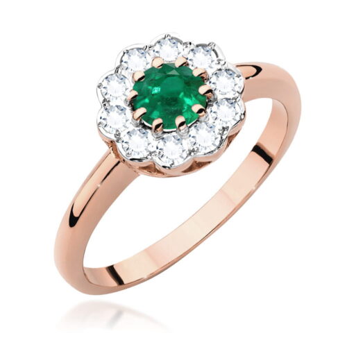 Złoty pierścionek z zielonym szmaragdem otoczonym przez diamenty w kształcie kwiatu.