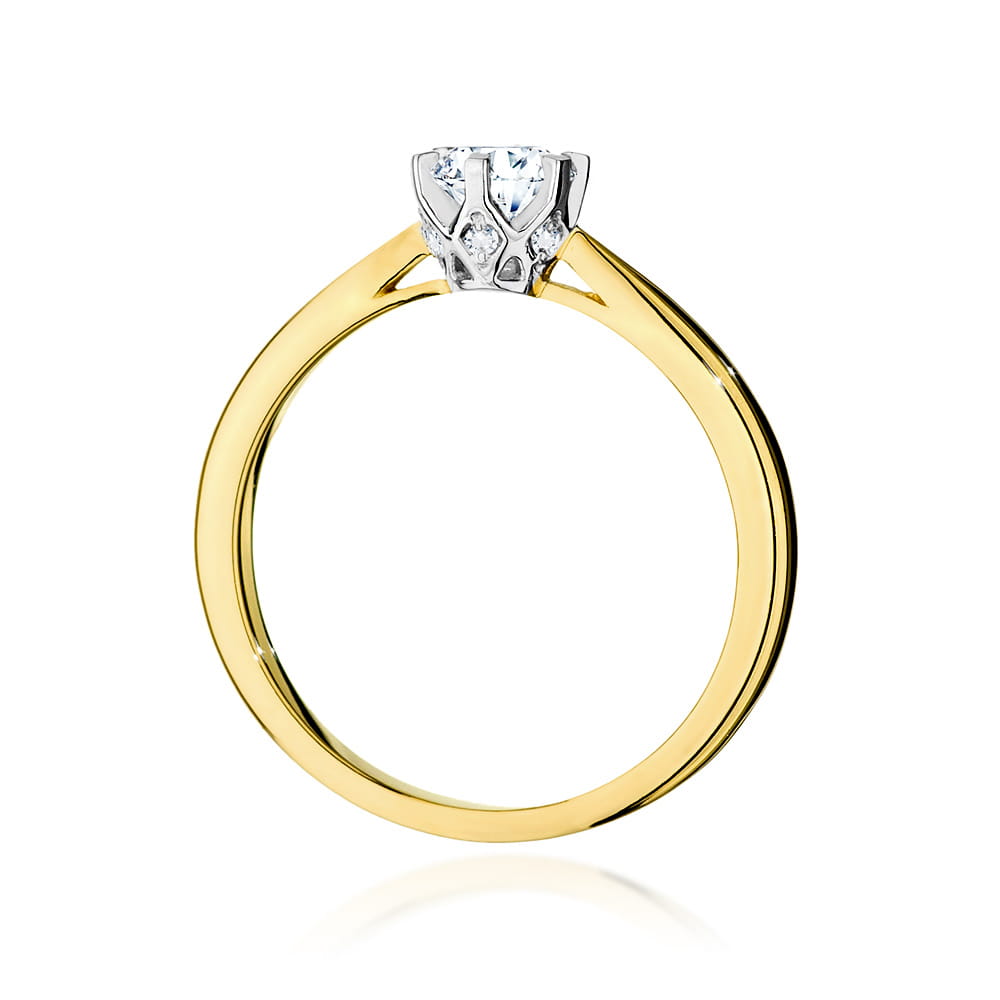 W0539.Z3.LDW.01_5 Złoty pierścionek z diamentem osadzonym w srebrnej koronie.