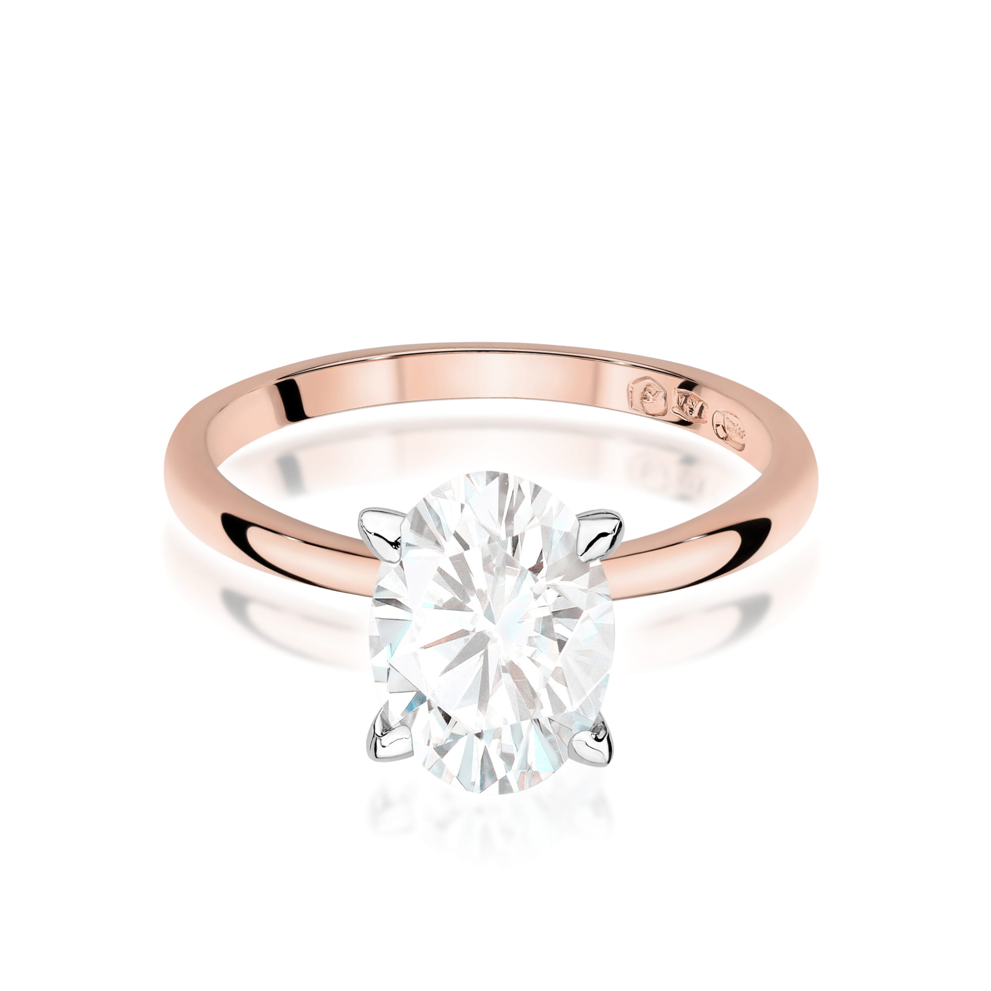 W0688.R3.LDW.01_2 Pierścionek z różowego złota z dużym, okrągłym diamentem osadzonym na czterech szprychach.